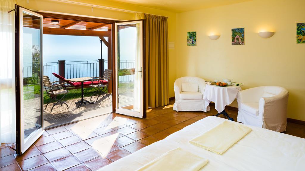 Отель Atrio Estreito Da Calheta Номер фото